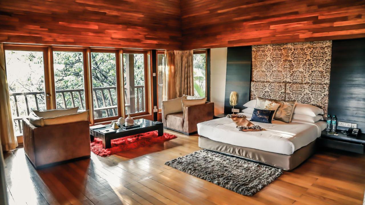 Aamby Valley City Lonavala Exteriör bild A bedroom at the Taj Bengal